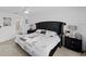 Beautiful main bedroom with large bed, ceiling fan, bedside tables and ample natural light at 4338 Finch Ln, Kissimmee, FL 34746