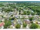 Residential aerial view featuring home with fenced backyard and neighborhood at 4607 Pine Lake Dr, St Cloud, FL 34769