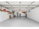 Spacious garage features painted walls, a water heater and extra storage space at 4607 Pine Lake Dr, St Cloud, FL 34769