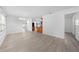 Open-concept living area features modern flooring, bright white walls, and plenty of space at 4607 Pine Lake Dr, St Cloud, FL 34769