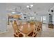Open dining area with abundant natural light, flowing into the kitchen and living spaces at 6396 Bennett Ct, St Cloud, FL 34771