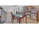 Dining area featuring a wooden table and chairs, surrounded by ample storage and bright natural light at 6396 Bennett Ct, St Cloud, FL 34771
