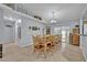Bright dining area with a large table, perfect for Gathering gatherings and entertaining at 6396 Bennett Ct, St Cloud, FL 34771