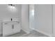 Bathroom featuring a vanity and a step-in shower with marble-look tile at 7 Spring Pass, Ocala, FL 34472