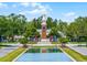 Clock Tower with pond and fountain at 8897 Rhodes St, Kissimmee, FL 34747