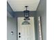 The front porch features a modern pendant light fixture and a 'Welcome' sign at 10 Pine Track Trl, Ocala, FL 34472