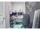 Office with two monitors, black office chair, and gray sound proofing at 10 Pine Track Trl, Ocala, FL 34472