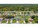 Aerial view showcases this cozy home nestled in a residential neighborhood close to scenic natural habitat at 1118 Saint Tropez Ct, Kissimmee, FL 34759