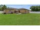 Spacious backyard with patio area and green lawn, perfect for outdoor activities at 1118 Saint Tropez Ct, Kissimmee, FL 34759