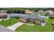 Well-maintained single-story home with a lush green lawn and attached garage in a quiet neighborhood at 1118 Saint Tropez Ct, Kissimmee, FL 34759