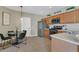 Bright eat-in kitchen featuring stainless steel appliances, tile flooring and breakfast nook at 1118 Saint Tropez Ct, Kissimmee, FL 34759