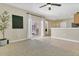 Spacious living room with tile floors, sliding glass door and neutral decor at 1118 Saint Tropez Ct, Kissimmee, FL 34759