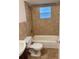 Bathroom with shower and tub combo, tiled walls, and new toilet at 1602 W 12Th St, Sanford, FL 32771