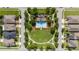 Community pool area with a playground, manicured lawns, sidewalks and mature trees provide a relaxing environment at 1703 Leatherback Ln, St Cloud, FL 34771
