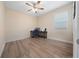 Bright bedroom with laminate flooring and a desk, great for a home office or guest room at 1703 Leatherback Ln, St Cloud, FL 34771