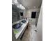 Bathroom features double sinks, a shower, natural light, and modern finishes, enhancing its appeal at 2013 Marilyn Ave, Winter Haven, FL 33881