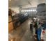 A car parked in a cluttered two-car garage at 2013 Marilyn Ave, Winter Haven, FL 33881