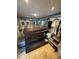 This indoor hot tub is surrounded by storage and includes a dark cover on the tub at 2013 Marilyn Ave, Winter Haven, FL 33881