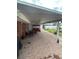 Spacious covered patio with brick paving, an outdoor seating area and swing at 2013 Marilyn Ave, Winter Haven, FL 33881