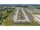 Panoramic aerial view of a community featuring townhomes and manicured landscaping at 2211 Tay Wes Dr, St Cloud, FL 34771