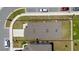 Property boundary outlined in aerial view showing yard and roof, surrounded by neighborhood at 2211 Tay Wes Dr, St Cloud, FL 34771
