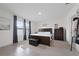 Comfortable bedroom with a large window, bed and carpet flooring at 2211 Tay Wes Dr, St Cloud, FL 34771