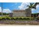 Thompson Grove community sign featuring manicured landscaping, stone accents, and clear community branding at 2211 Tay Wes Dr, St Cloud, FL 34771