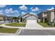 Charming single-Gathering home with a well-maintained lawn, attached two-car garage and neutral color palette at 2211 Tay Wes Dr, St Cloud, FL 34771