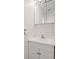 Bathroom featuring a modern vanity with new hardware, bright lighting and updated sink at 2343 St George Dr, Davenport, FL 33837