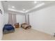 Spacious bedroom with recessed lighting, large windows, and modern flooring at 2668 Coachman Dr, Deltona, FL 32738