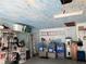Cluttered garage with painted ceiling and lots of storage capacity at 2700 Cherokee Rd, St Cloud, FL 34772