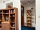 Hallway features a built-in bookshelf and access to another room at 2700 Cherokee Rd, St Cloud, FL 34772
