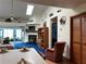 Bright living room features fireplace, built-in shelving, and high ceilings at 2700 Cherokee Rd, St Cloud, FL 34772