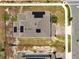 Aerial view of a home with a large roof, solar panels, a driveway, and well-kept landscaping at 2759 Slash Way, St Cloud, FL 34771