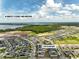 Community aerial view with parks and bodies of water with a note that it is 45 minutes from Disney and Universal Studios at 2759 Slash Way, St Cloud, FL 34771