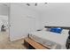 Bedroom with carpet flooring and view to adjacent room at 2759 Slash Way, St Cloud, FL 34771