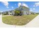 Charming two-story home featuring a two-car garage, brick accents, and freshly manicured front yard at 2759 Slash Way, St Cloud, FL 34771