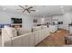 Spacious living room flows seamlessly into the dining area and kitchen, creating an open and inviting atmosphere for entertaining at 2759 Slash Way, St Cloud, FL 34771