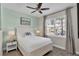 Serene bedroom featuring a comfortable bed, soft lighting, and a calming color palette for restful nights at 2993 Caribbean Soul Dr, Kissimmee, FL 34747