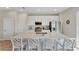 Bright kitchen with stainless steel appliances, a large island, and bar stool seating for casual dining at 2993 Caribbean Soul Dr, Kissimmee, FL 34747