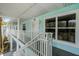Condo entrance with stairs leading up to a second-story unit, showing the unit number at 3111 Sun Lake Ct # B, Kissimmee, FL 34747