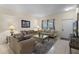 Comfortable living room showing neutral colors, tile floors, and an inviting seating area at 3111 Sun Lake Ct # B, Kissimmee, FL 34747