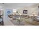 Spacious living room featuring tile flooring, neutral colors, and comfortable seating arrangement at 3111 Sun Lake Ct # B, Kissimmee, FL 34747