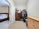 Walk-in closet with shelving units, next to bedroom, providing convenient storage solutions at 3193 Crispin Cir, Harmony, FL 34773