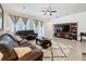 Spacious living room with plush sofa, large windows and stylish decor for relaxation at 3193 Crispin Cir, Harmony, FL 34773