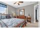 Cozy bedroom with wood furnishings, and great natural light at 3214 Herons Point Cir, Kissimmee, FL 34741