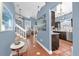 Open-concept entryway with views into the living, dining and kitchen area boasts neutral paint and tile floors at 3214 Herons Point Cir, Kissimmee, FL 34741