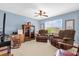 Large loft with comfortable chairs, great lighting, and a spacious layout for relaxing at 3214 Herons Point Cir, Kissimmee, FL 34741