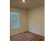 Comfortable carpeted bedroom with ample natural light from the window at 359 Arbor Lakes Dr, Davenport, FL 33896