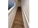 Carpeted staircase with white railings leading to the upper level of the home at 359 Arbor Lakes Dr, Davenport, FL 33896